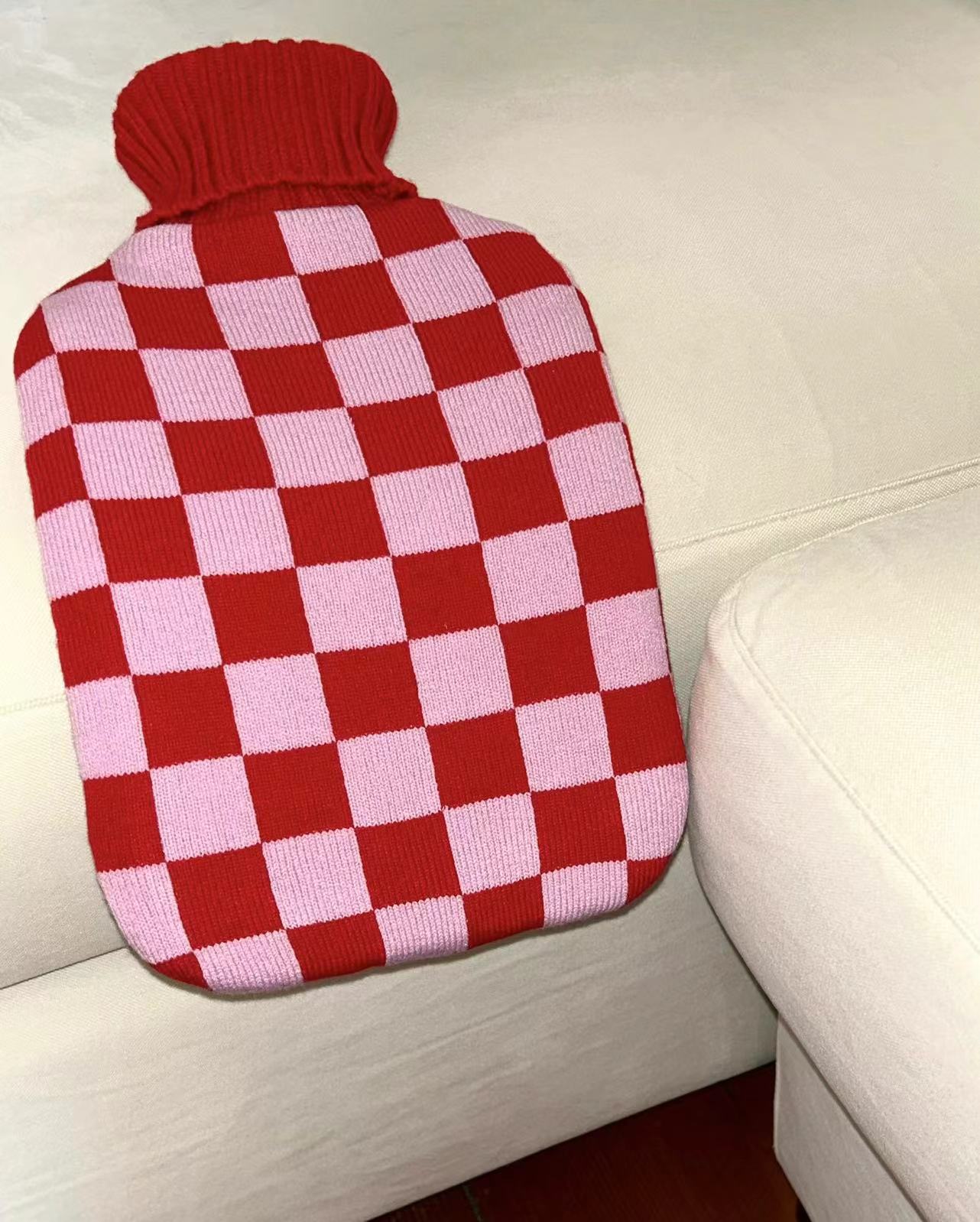 Blush Hot Water Bottle with Cover - Casa Rolio organic, colourful, designer hot water bottle. Crafted for comfort and style, this vibrant, eco-friendly accessory adds a touch of luxury while keeping you warm and cozy.