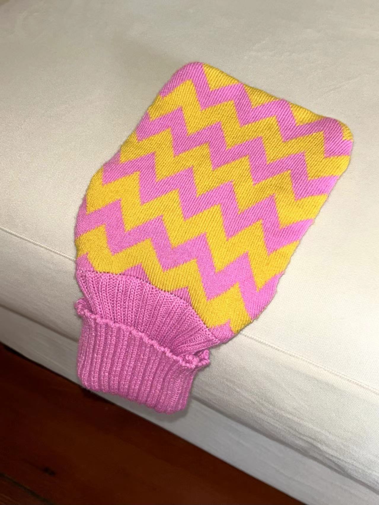 Candy Hot Water Bottle with Cover - Casa Rolio organic, colourful, designer hot water bottle. Crafted for comfort and style, this vibrant, eco-friendly accessory adds a touch of luxury while keeping you warm and cozy.
