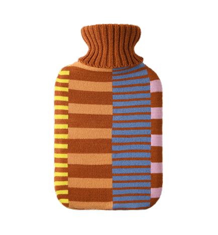 Deconstructed Hot Water Bottle with Cover - Casa Rolio organic, colourful, designer hot water bottle. Crafted for comfort and style, this vibrant, eco-friendly accessory adds a touch of luxury while keeping you warm and cozy.