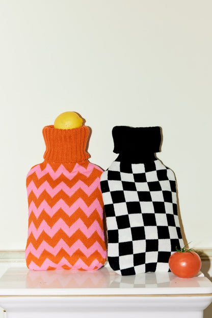 Casa Rolio organic, colourful, designer hot water bottles. Crafted for comfort and style, this vibrant, eco-friendly accessory adds a touch of luxury while keeping you warm and cozy.
